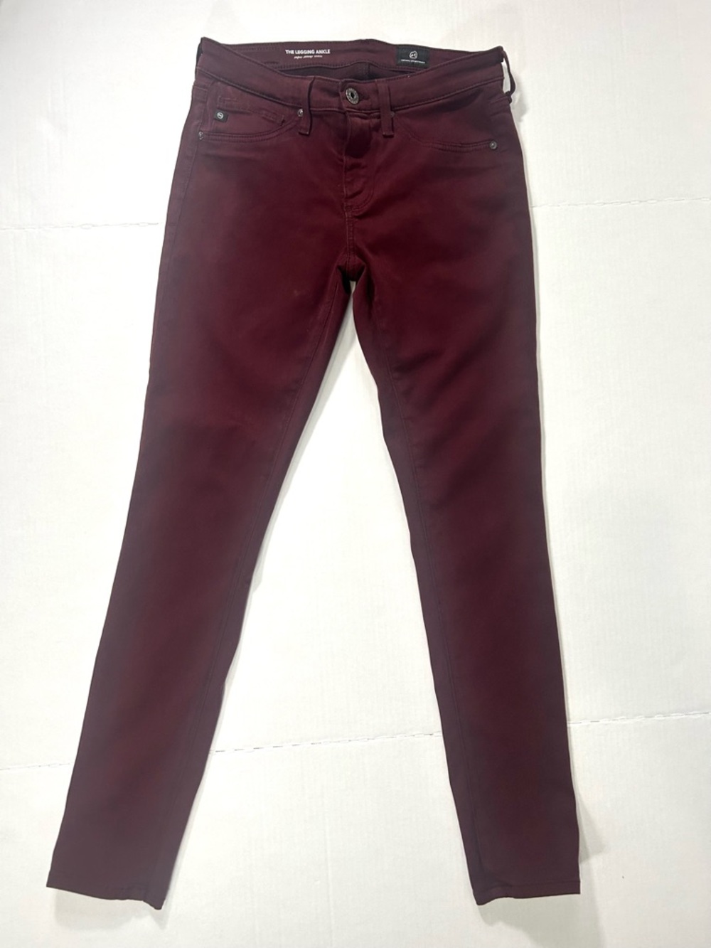 Ag Adriano Goldschmied women’s Skinny Ankle Jeans in Burgundy Red